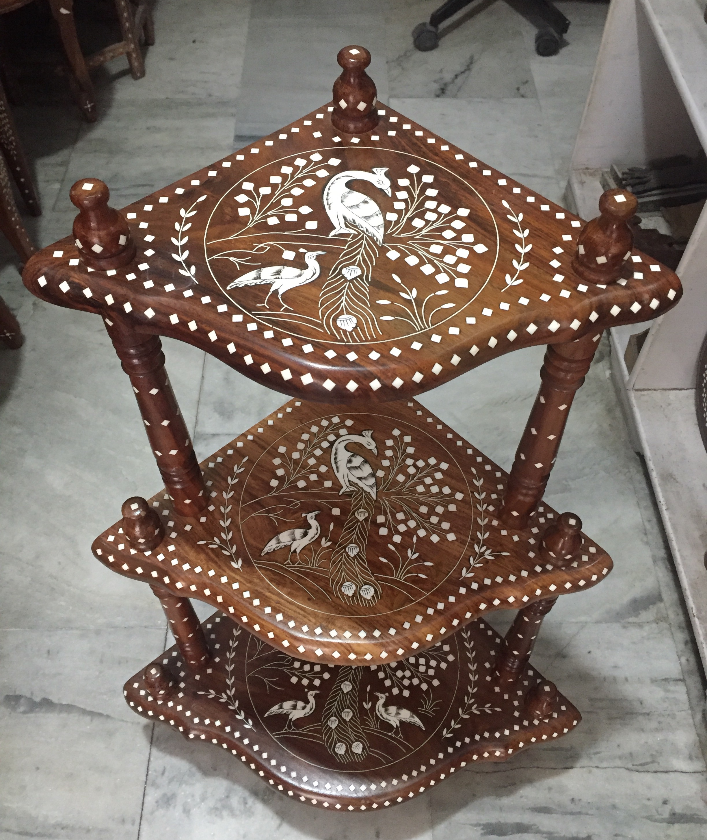 wooden inlay steps corner with peacock